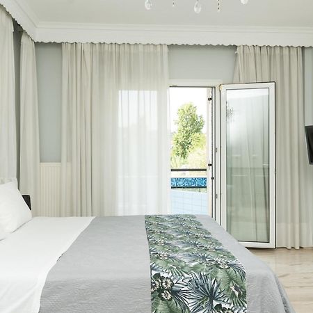 Glykanisos Suites Néa Péramos 外观 照片