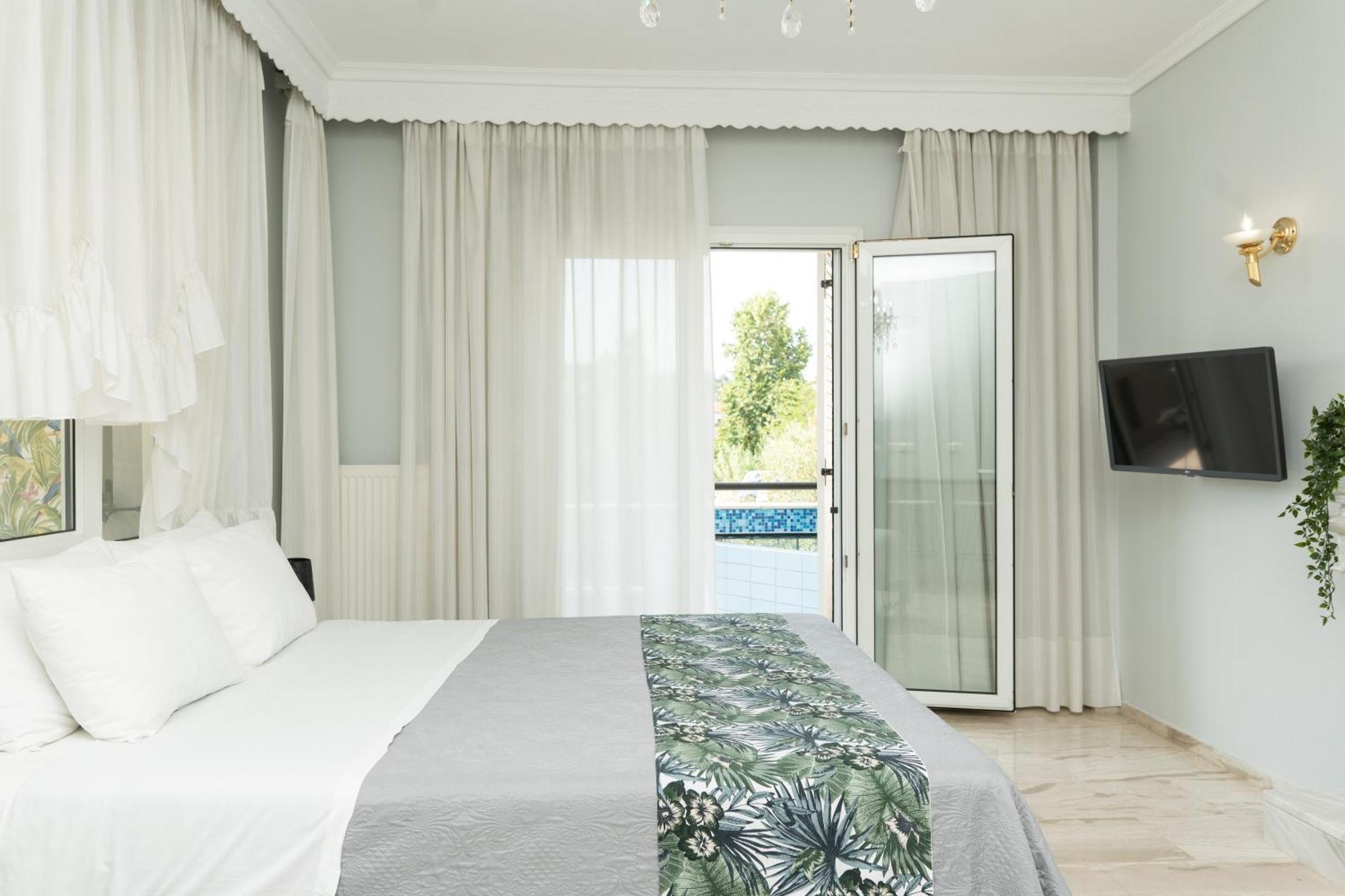 Glykanisos Suites Néa Péramos 外观 照片